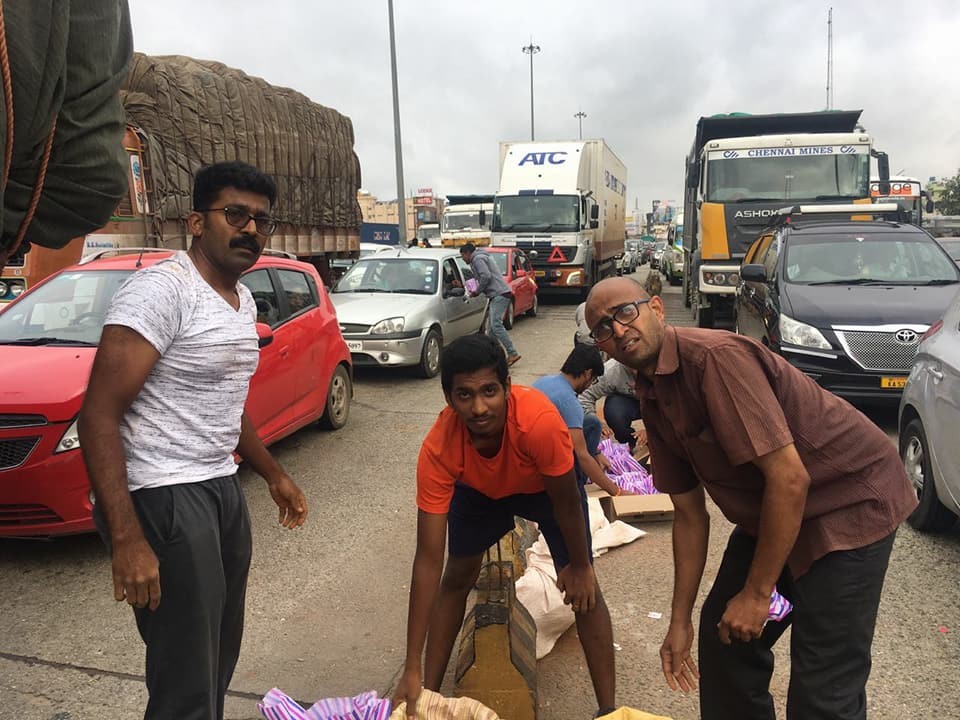 SEED BALLS  DISTRIBUTION  BEING DONE AT ATTIBELE TOLL